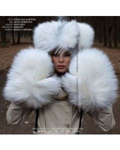 Woman wearing Arctic Marble Fox teddy-style fur hat and full mittens, showcasing white and silver natural fur texture